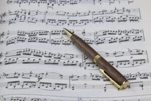 picture of sheet music with pen